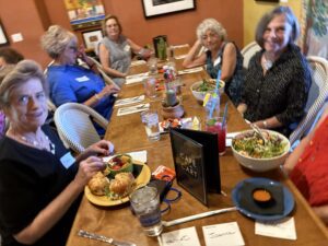 Group of women dining at a cafe table
