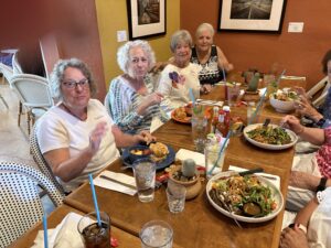 Group of women enjoying lunch at restaurant