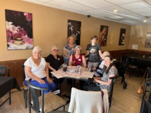 Senior women dining at restaurant table