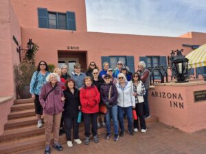 Group of visitors posing outside Arizona Inn