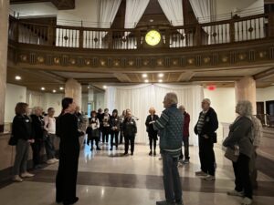 Guided tour group in grand historic lobby