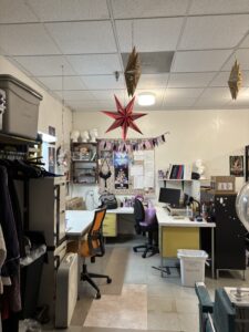 Colorful craft workspace with hanging star decorations