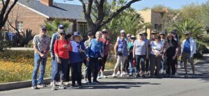 Neighborhood walking group posing outdoors