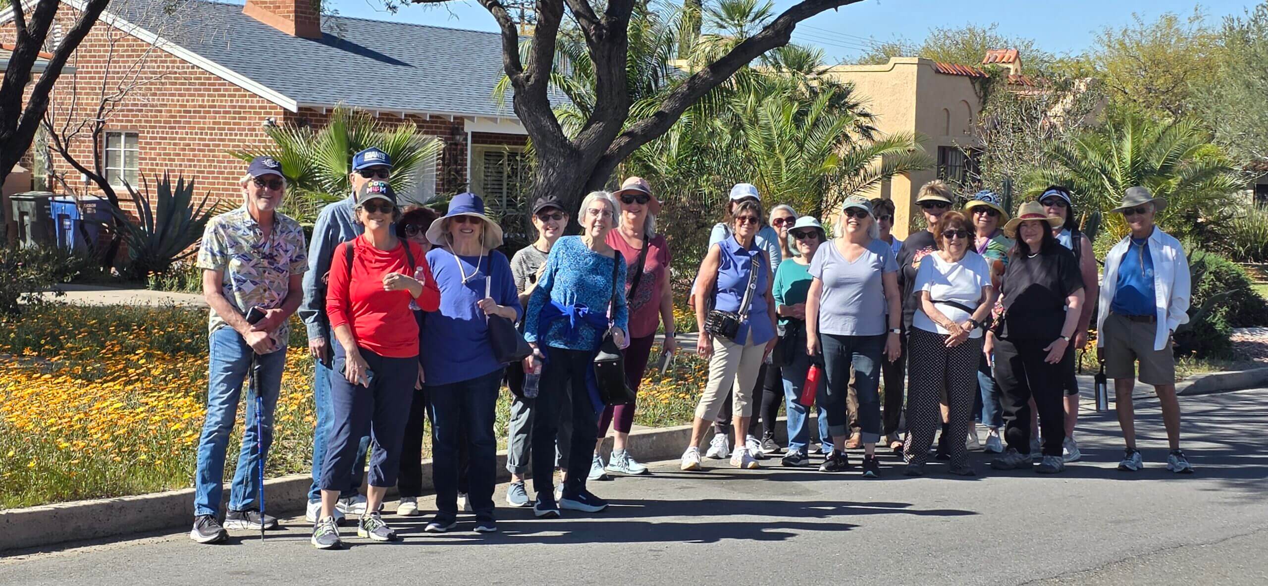 Neighborhood walking group posing outdoors