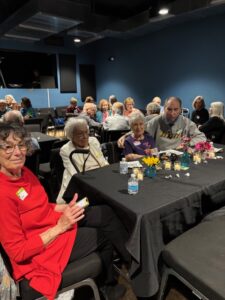 Seniors socializing at indoor community event