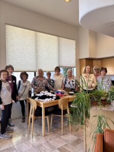 Women crafting around kitchen table
